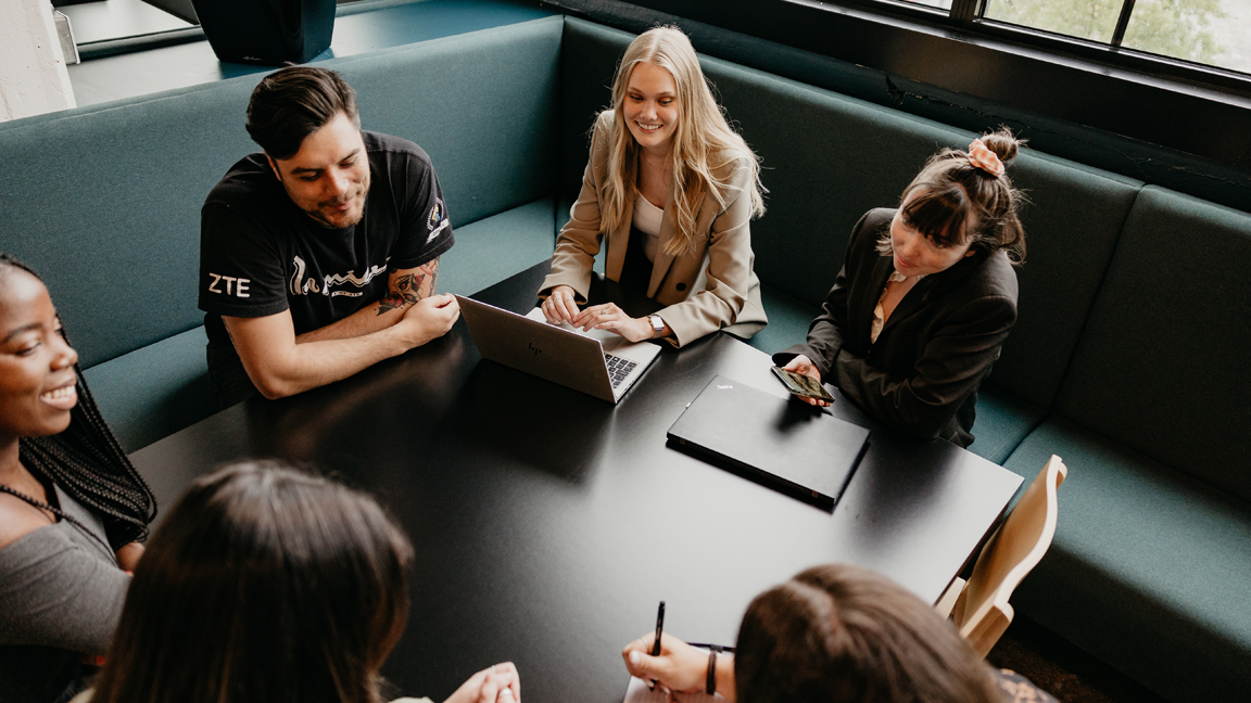 People at a meeting table